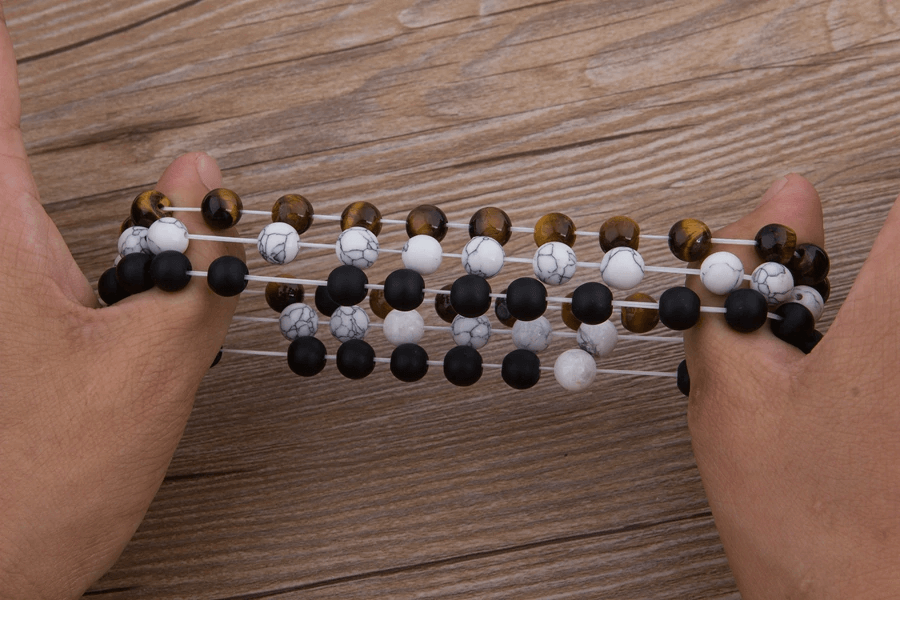 Demonstração do Elástico da Pulseira Ônix Olho de Tigre